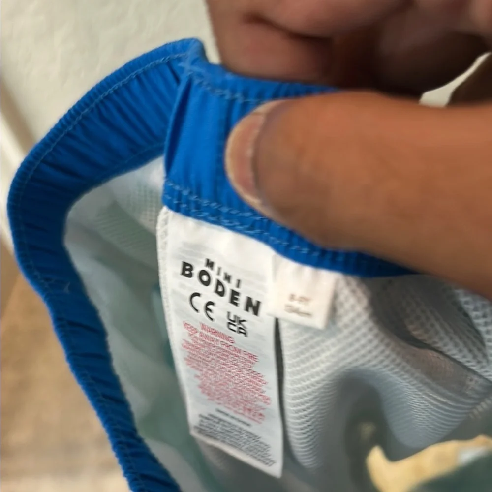 Mini BodenKids Swim Trunks with Green Alligator Print 8-9y